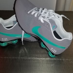 Grey &Teal Nikes.